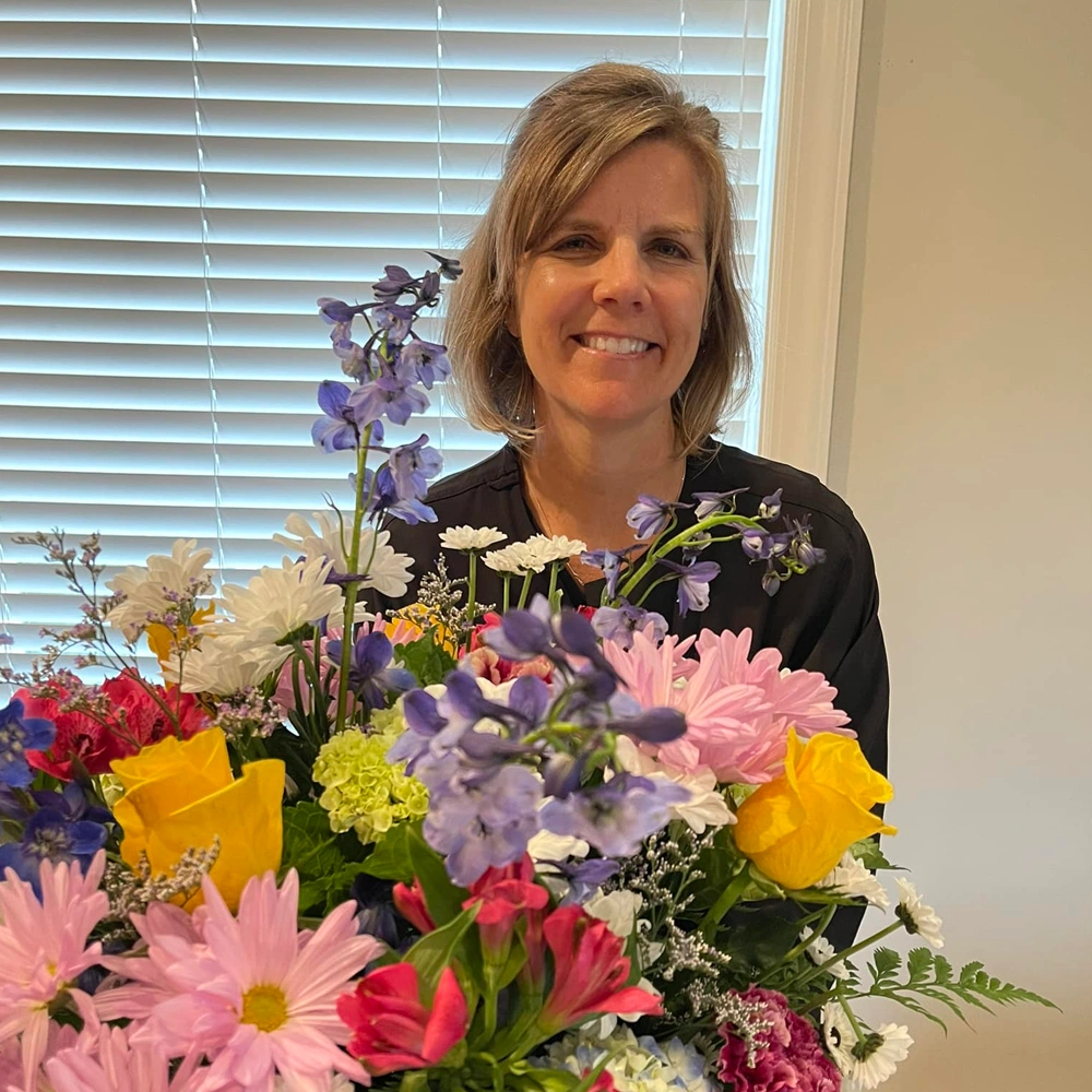 Cocalico Dental staff member with flowers